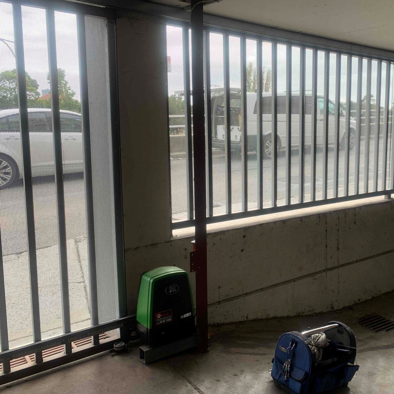 Locker Perforated mesh used as infill on automatic gate to garage basement