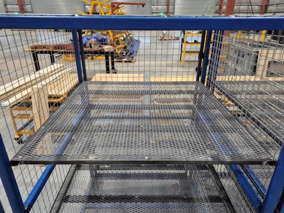 Expanded mesh forms shelves for kitting cages at HVAC and Refrigeration Equipment facility