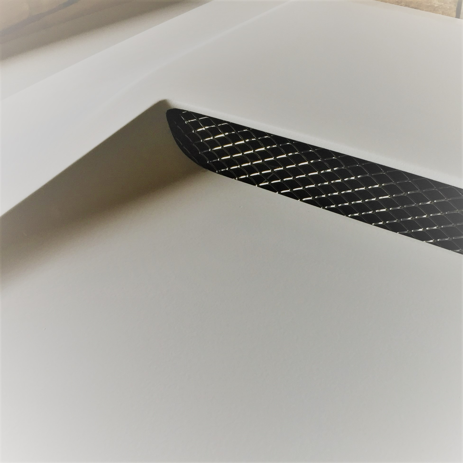 expanded mesh used to create ventilation to custom car bonnet