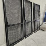 Webforge Locker M003518S41220 woven wire used as the insert in these custom security screen doors fabricated by Urban forge