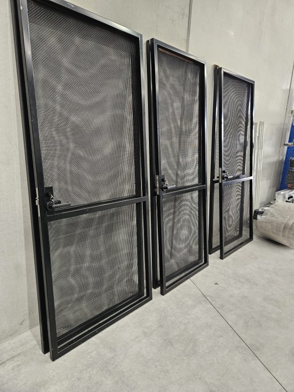 Webforge Locker M003518S41220 woven wire used as the insert in these custom security screen doors fabricated by Urban forge