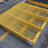 Mild Steel grating as surface to heavy duty pallets painted safety yellow