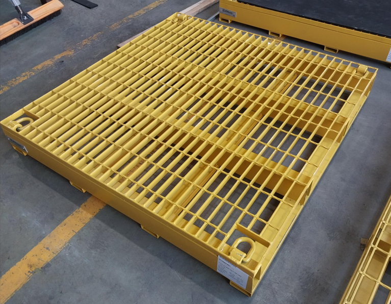 Mild Steel grating as surface to heavy duty pallets painted safety yellow